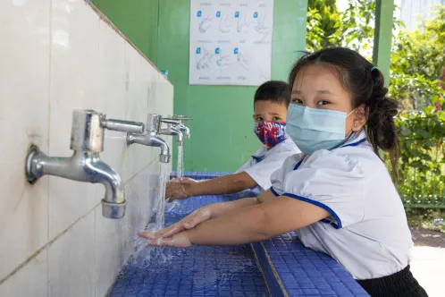 Child washes hands