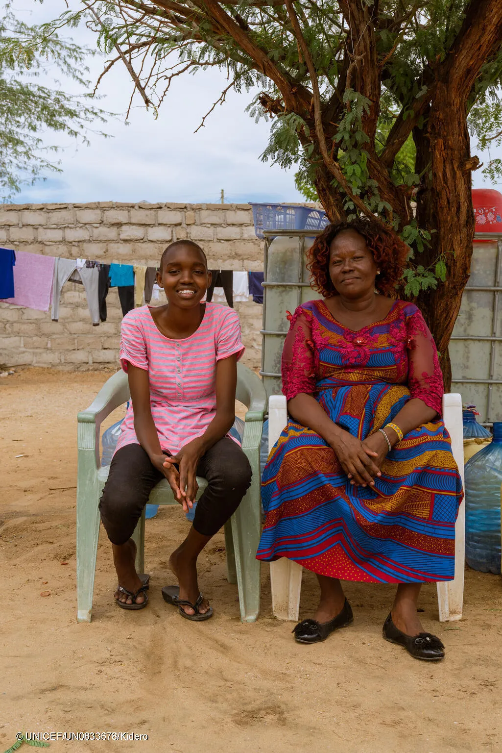Sharlyne at home with her aunt Sophia, who she calls mum.