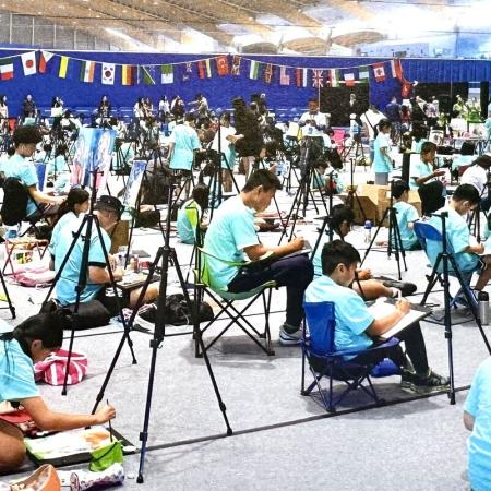 Children painting during a painting olympics in Vancouver. 