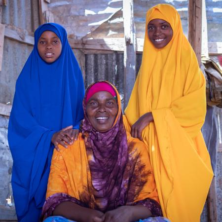 Habiba (Center) with her two children Hawa and Aniso pose for the photo in Xaar-Xaar south of Galkayo in Galmudug State of Somalia.