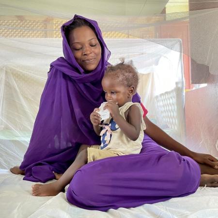 A girl receives ready-to-use therapeutic food in a stabilisation center in El Fasher, North Darfur. Unfortunately, the nutrition crisis is Sudan is worsening with a record number of children admitted to this center where children suffering from severe acute malnutrition with medical complications are treated.