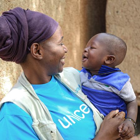 Woman holding a child