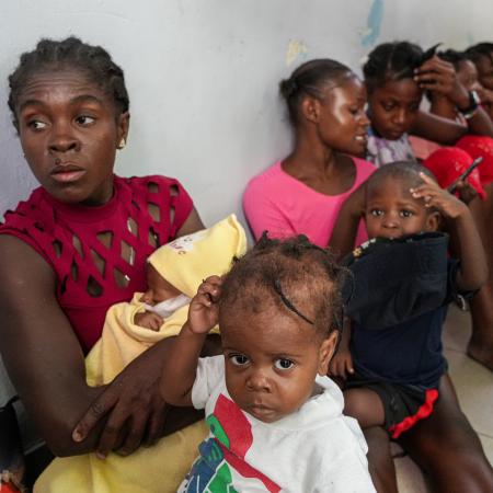 An image of mothers and children at La Paix University Hospital, where hundreds of mothers brought their children for screening and treatment of malnutrition. 