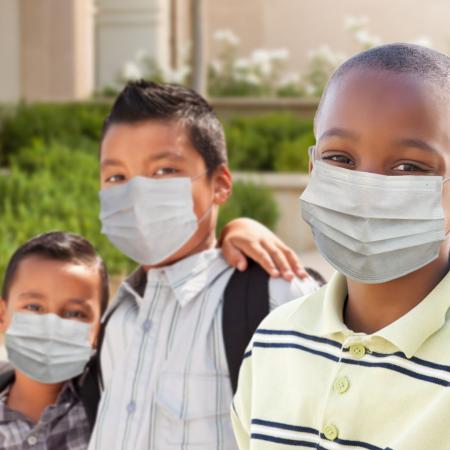 Group of 3 young boys masked